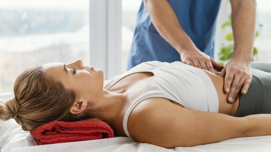 https://traveltopchoice.com/storage/2024/11/front-view-male-osteopathic-therapist-checking-female-patient-s-abdomen_0.jpg