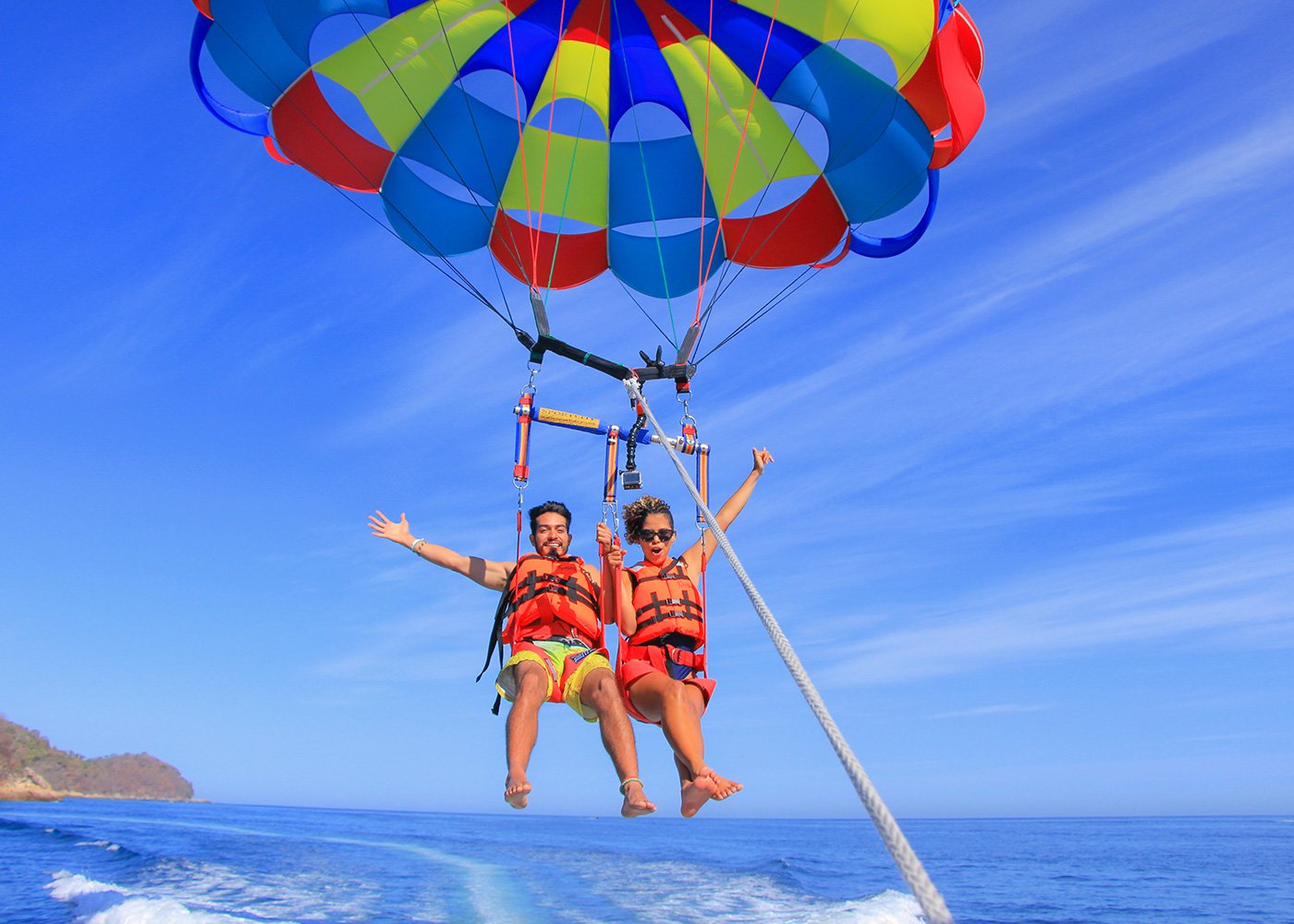 https://traveltopchoice.com/storage/2024/12/blog-parasailing.jpg