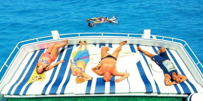 https://traveltopchoice.com/wp-content/uploads/2024/11/Orange_Bay_Island_Trip_Hurghada_234607.jpg