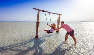 https://traveltopchoice.com/wp-content/uploads/2024/11/Orange_Bay_Island_Trip_Hurghada_507865-1.jpg