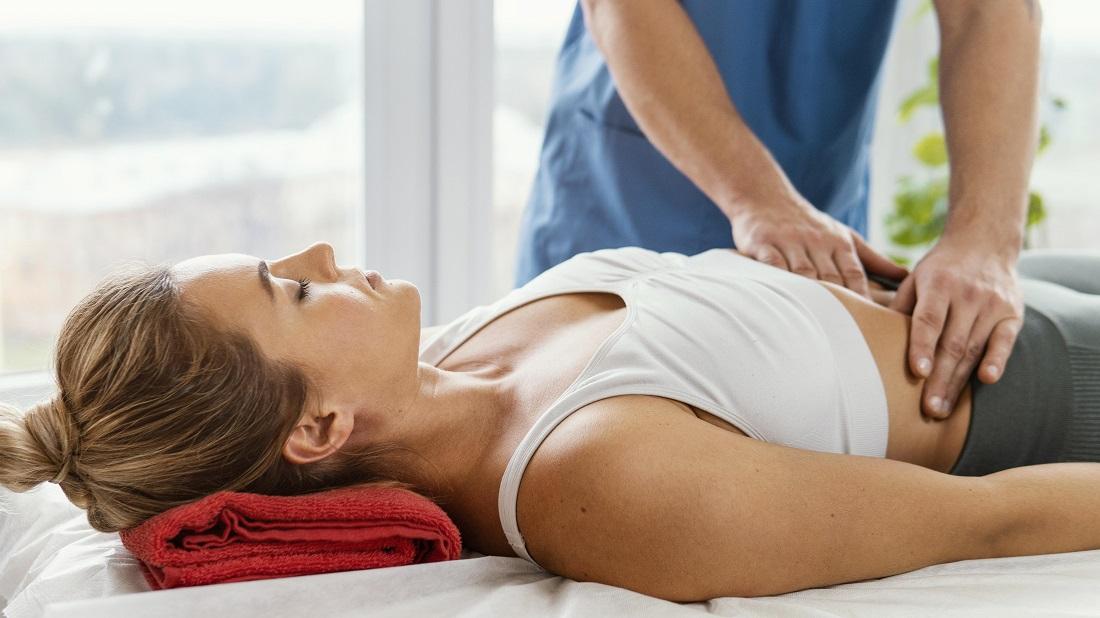 https://traveltopchoice.com/wp-content/uploads/2024/11/front-view-male-osteopathic-therapist-checking-female-patient-s-abdomen_0.jpg